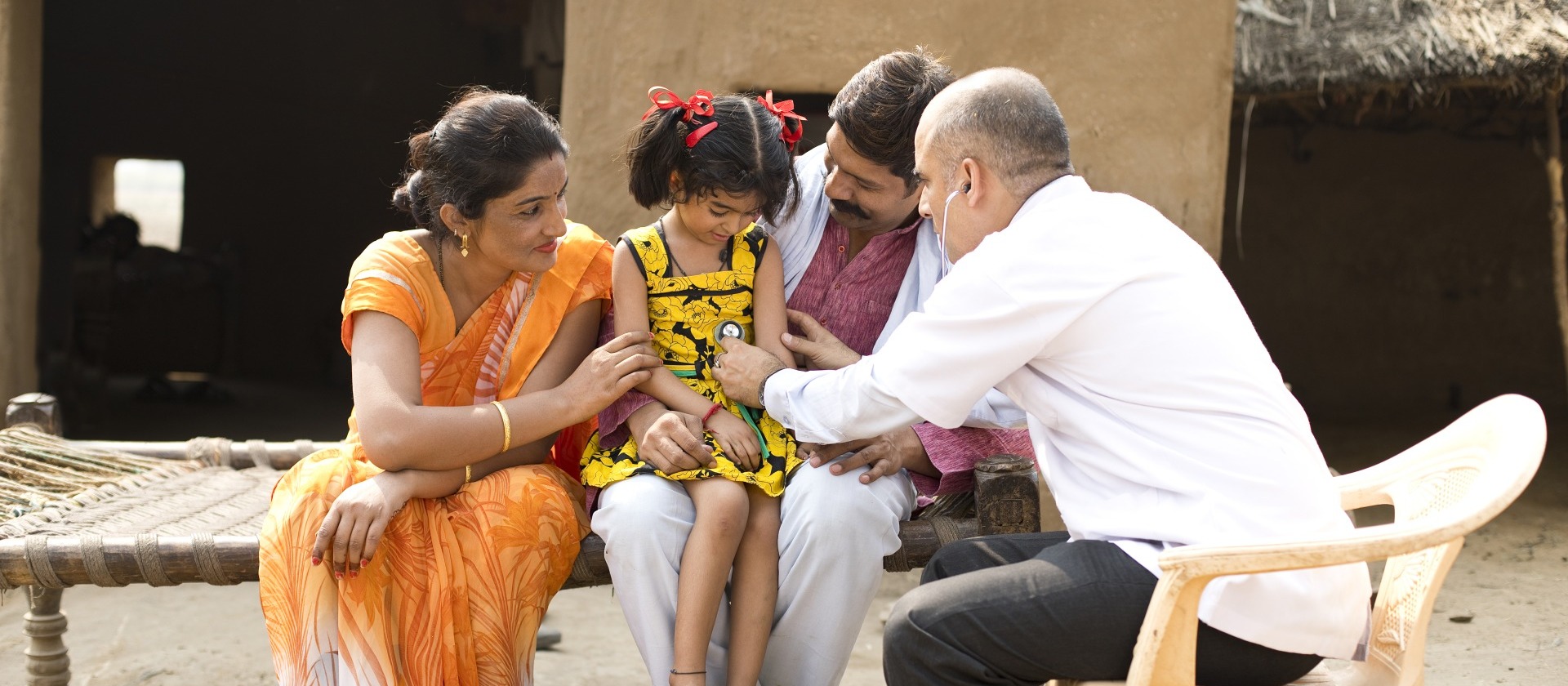 doctor-inspecting-family