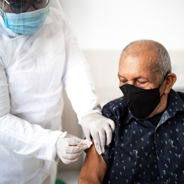 health-worker-preparing-injection-site