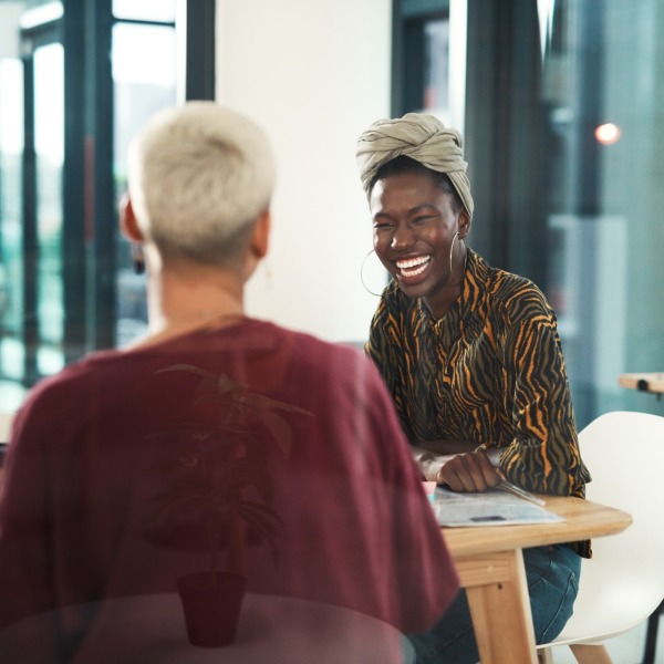 woman-laughing-in-office
